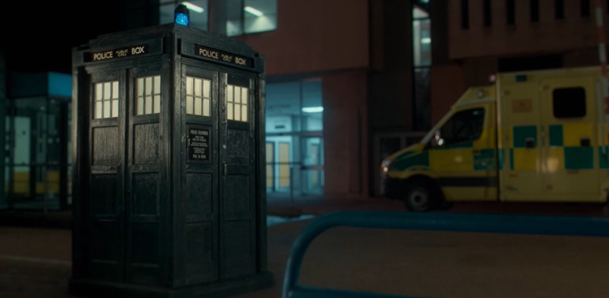 The TARDIS landing outside the hospital that Belinda works at